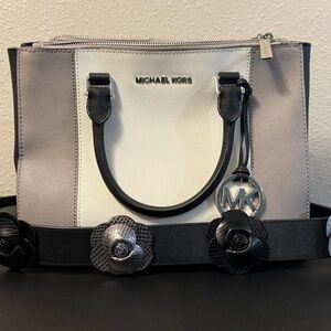 Michael Kors Handbag with Leather Rosette guitar style strap
